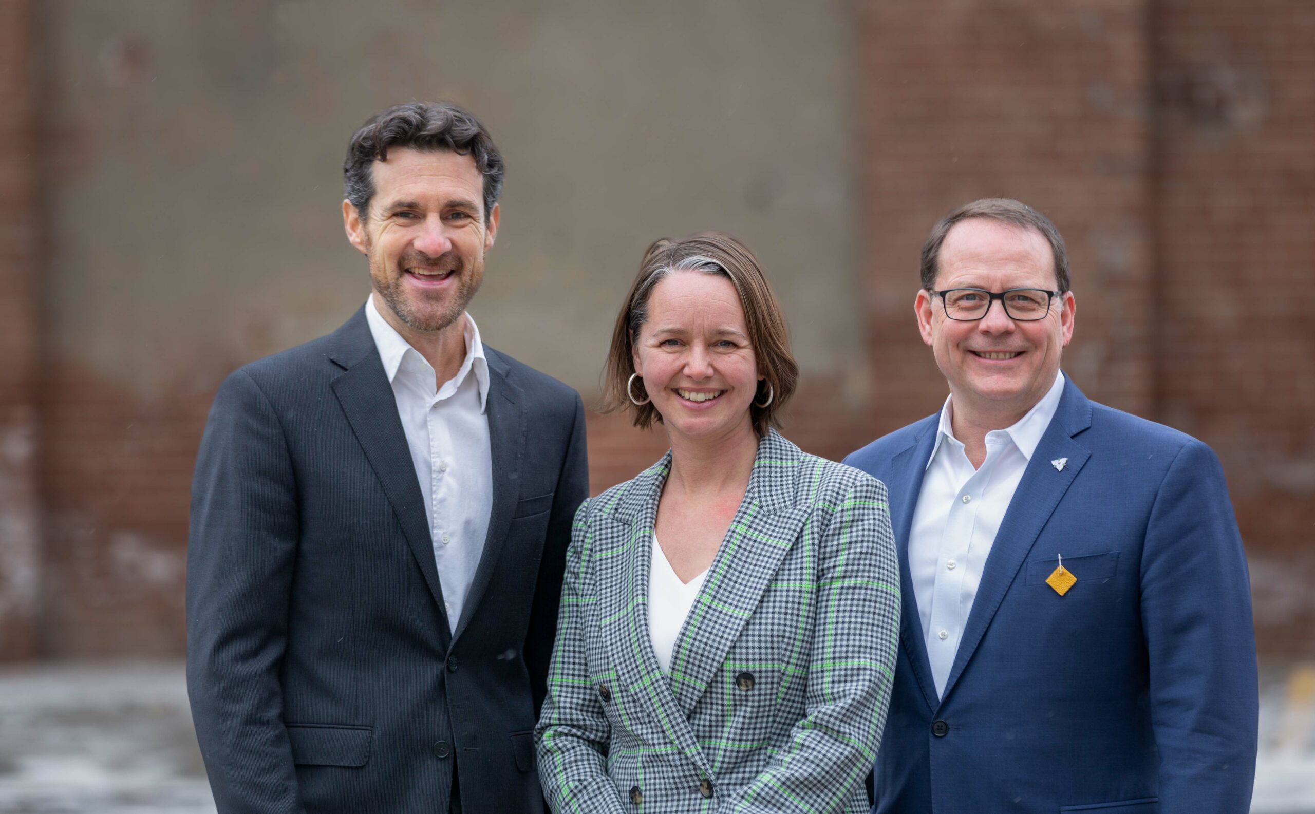 Mike Schreiner 
Aislinn Clancy and 
Matt Richter standing together smiling