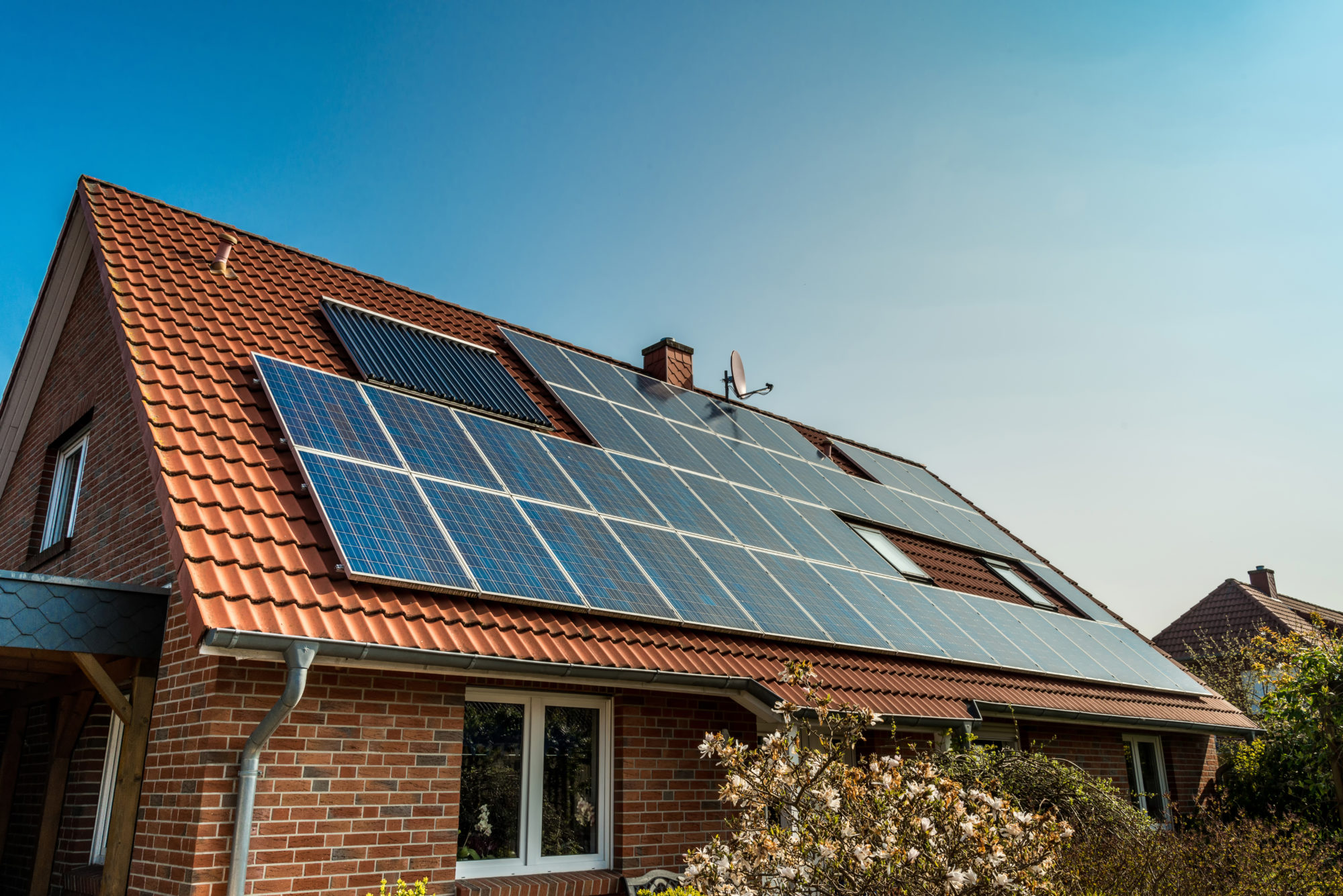 Solar panels installed on roof of house