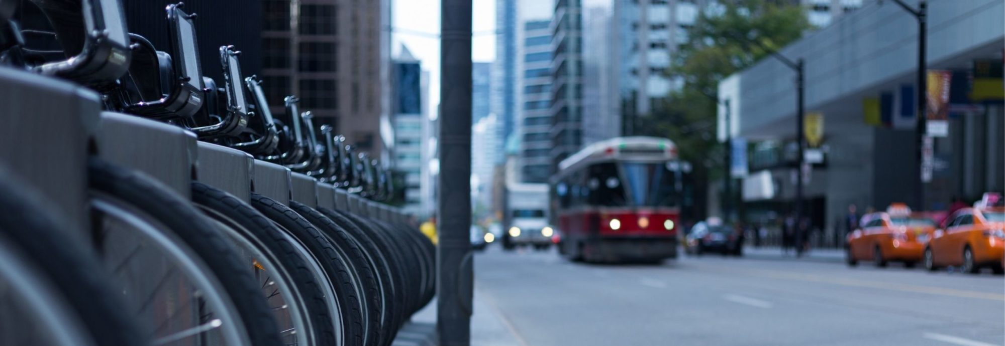 Row of e-bikes along downtown Toronto street